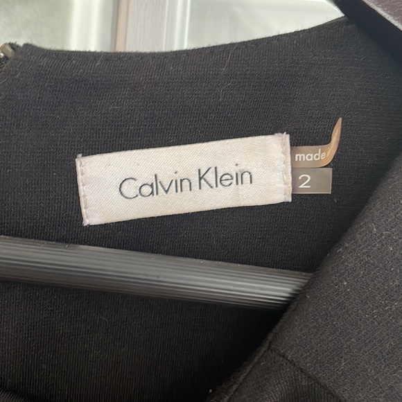 Used Calvin Klein black 3/4 sleeve dress with pleather detail skirt - Picture 2 of 5